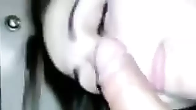 A pretty Tajik girl takes her friend's penis in her mouth