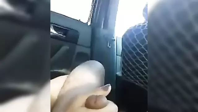 A girl gives a gentle handjob to a Tajik woman in a car